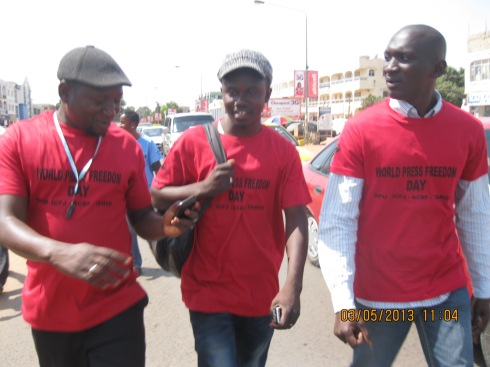  - 8-l-r-freelance-journalist-saloum-sheriff-janko-editor-of-the-daily-news-saikou-jammeh-gambia-affairs-publisher-saikou-ceesay-at-the-procession-photo-credit-msjoofglobefpi